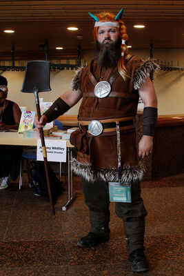 One of the few elaborate theme-related costumes this year_ (Few is more than there usually are_) I think this may be my favourite viking cosplayer at this year's GalaCon_ The costume fits him_ And he was super-nice_