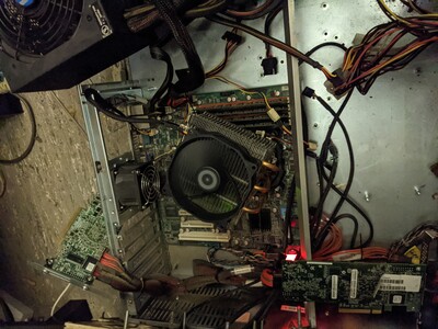 The cooler mount wasn't made for that socket. I think it was for an AMD socket. The bracket was really strong and tight and eventually broke in two. The CPU lid didn't take any damage though and I simply used a few zipties to hold the cooler in place without much preasure on the CPU. That still was enough to cool the CPU passively and the machine ran three quarters of a year that way.