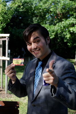 Saul Gutmann, a lawer very much in character most of the time posing for the camera after his other standard move: giving everybody that he just met one of his business cards.