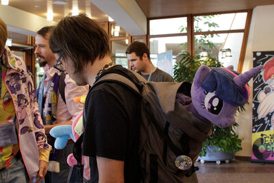Large plushies can poke out of backpacks as well.
